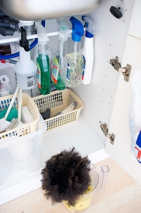 Use Tension Rod to Hang Spray Bottles Under Your Sink. - Top 58 Most Creative Home-Organizing Ideas and DIY Projects