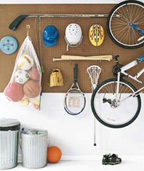 Use a Pegboard with Hooks to Organize Sport Gears - Top 58 Most Creative Home-Organizing Ideas and DIY Projects