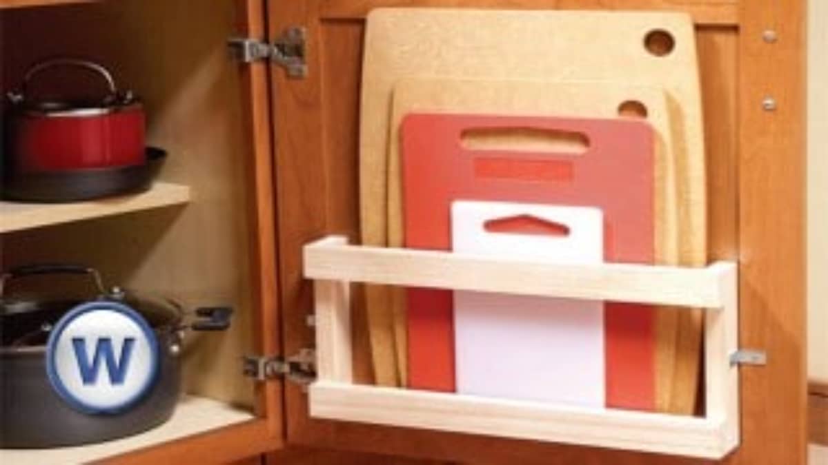 Store Cutting Boards in Your Cabinets with a Magazine Rack