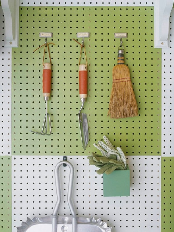 Use Nylon Tool Holders - 49 Brilliant Garage Organization Tips, Ideas and DIY Projects
