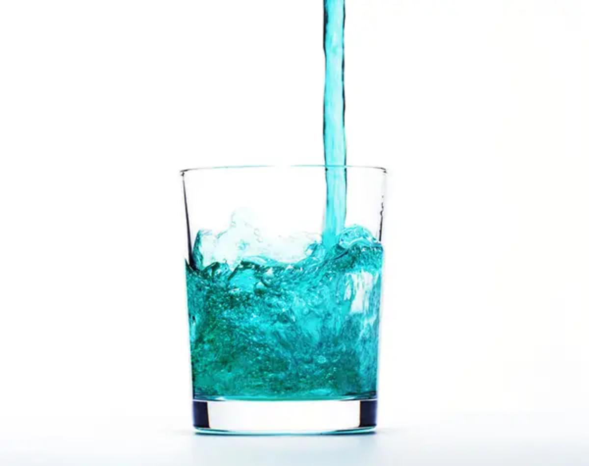 A cup of mouthwash.