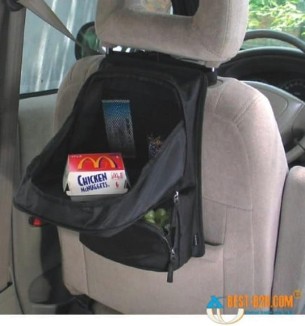 Backpack used as a desk in a car.