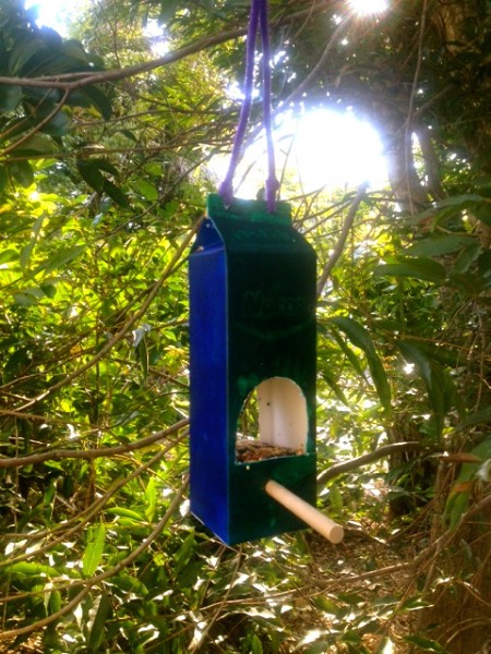Milk Carton Feeder - 23 DIY Birdfeeders That Will Fill Your Garden With Birds