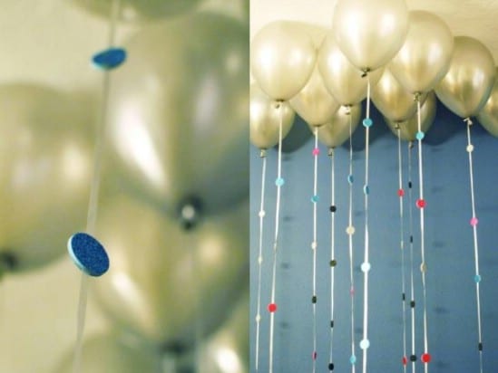 Sparkly Balloon Garland - 28 Fun and Easy DIY New Year’s Eve Party Ideas