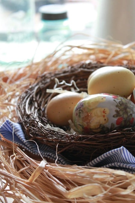 Raffia Nest on Pedestal - 40 Beautiful DIY Easter Centerpieces to Dress Up Your Dinner Table