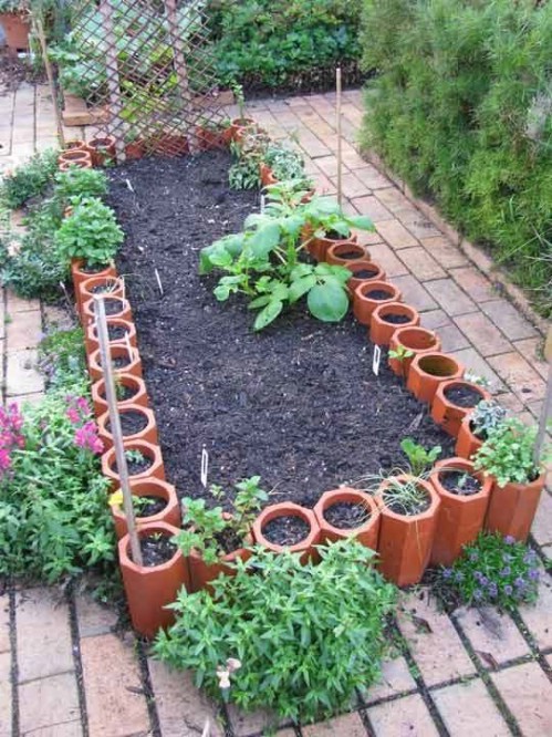 Formed Terra Cotta Gardens - 40 Genius Space-Savvy Small Garden Ideas and Solutions