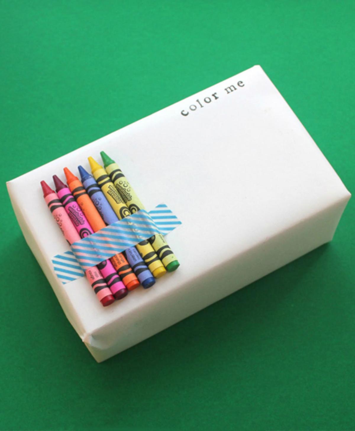 DIY crayons and white paper gift wrapping.