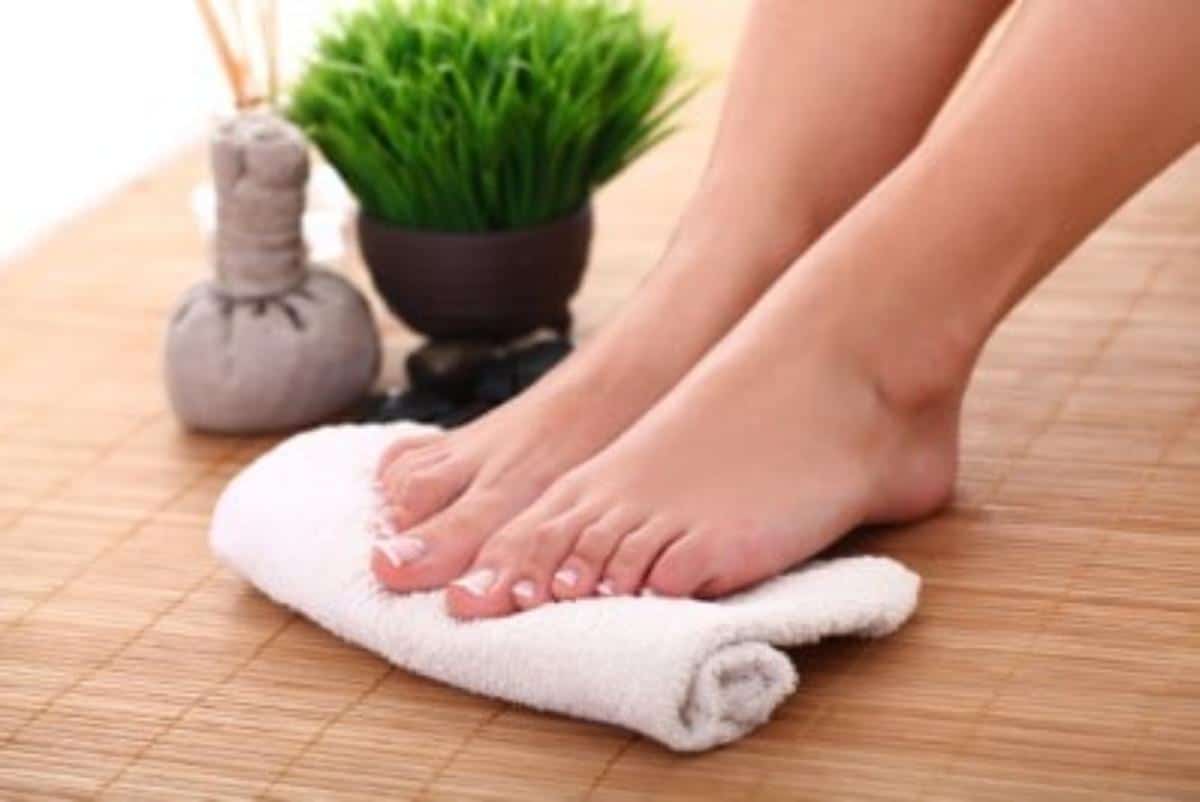 A foot massage on a towel