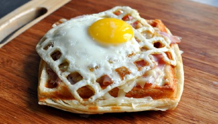Breakfast sandwich - 35 Delicious Foods You Didn't Know You Could Cook in Your Waffle Iron