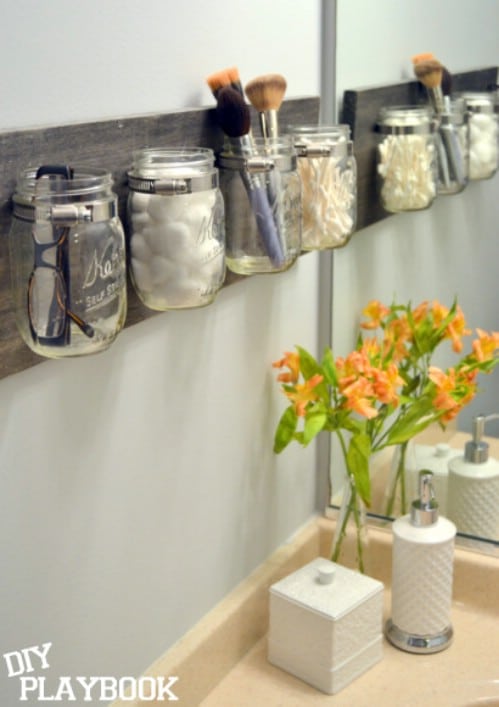 Mason jar organizer - 50 Decorative Rustic Storage Projects For a Beautifully Organized Home