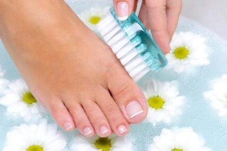 Scrub your feet. - 40 Life-Changing Ways to Use Epsom Salt in Your Everyday Life