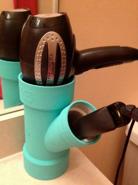 Store your hairdryer in a PVC pipe.