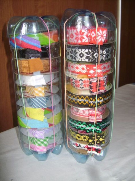 Use old plastic bottles to store ribbon, twine, or whatever else.