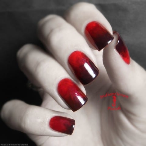 Beautifully blended red and black nails
