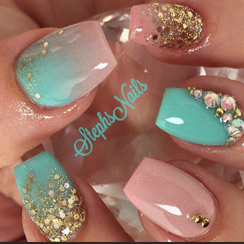 Blue, pink, and gold nails