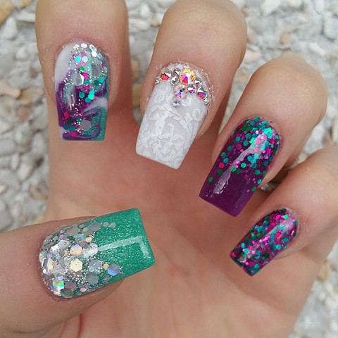 Purple, green, and white eclectic nails