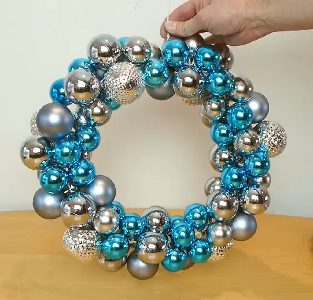 How to Make a Festive Christmas Wreath Out of an Old hanger and Cheap Ornaments {Video}