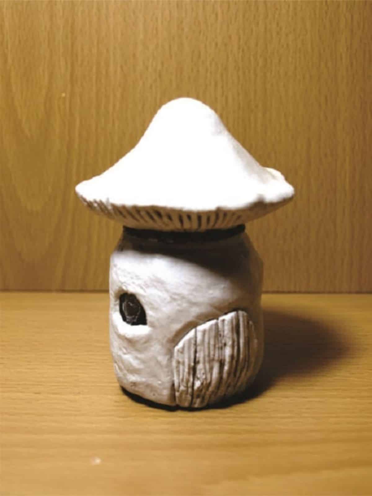 Clay shaped mushroom fairy.