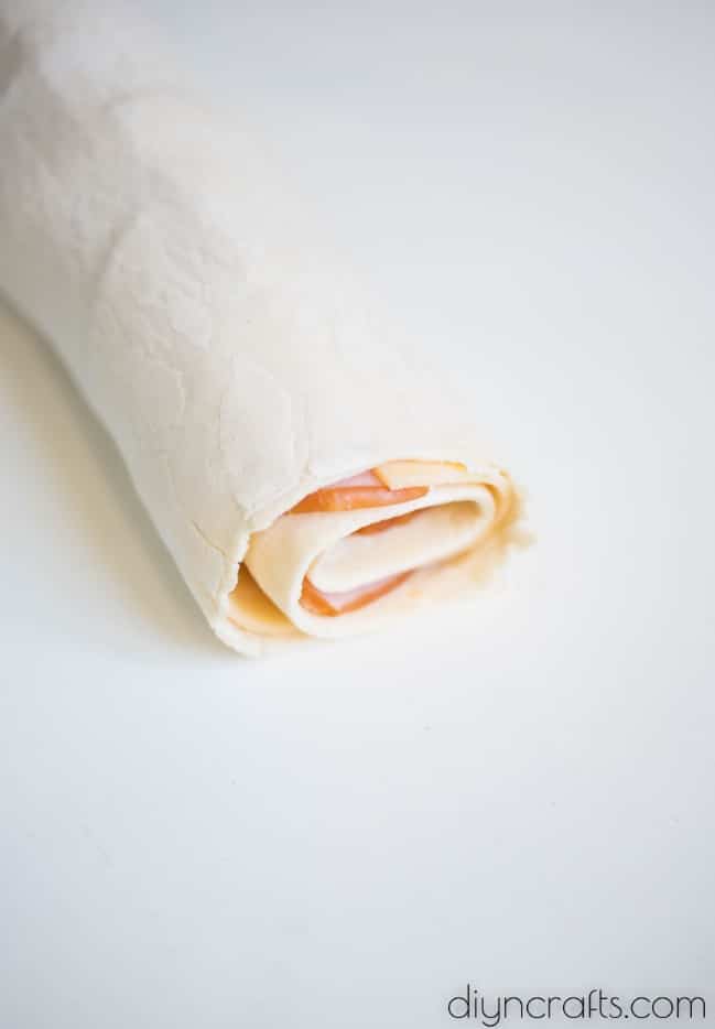 Cheese and ham rolled up.