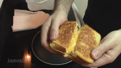 Make grilled cheese on parchment paper.