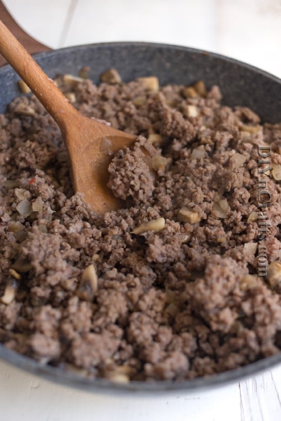Brown ground beef with onions until no longer pink