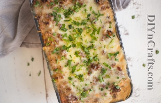 Top with cheese and herbs and let melt