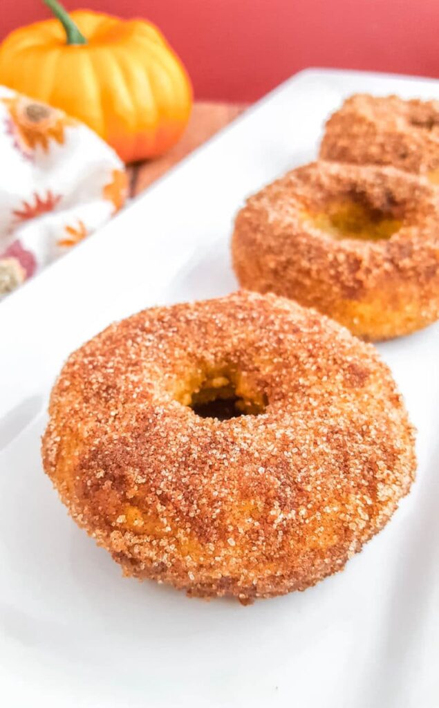 Donuts on white platter