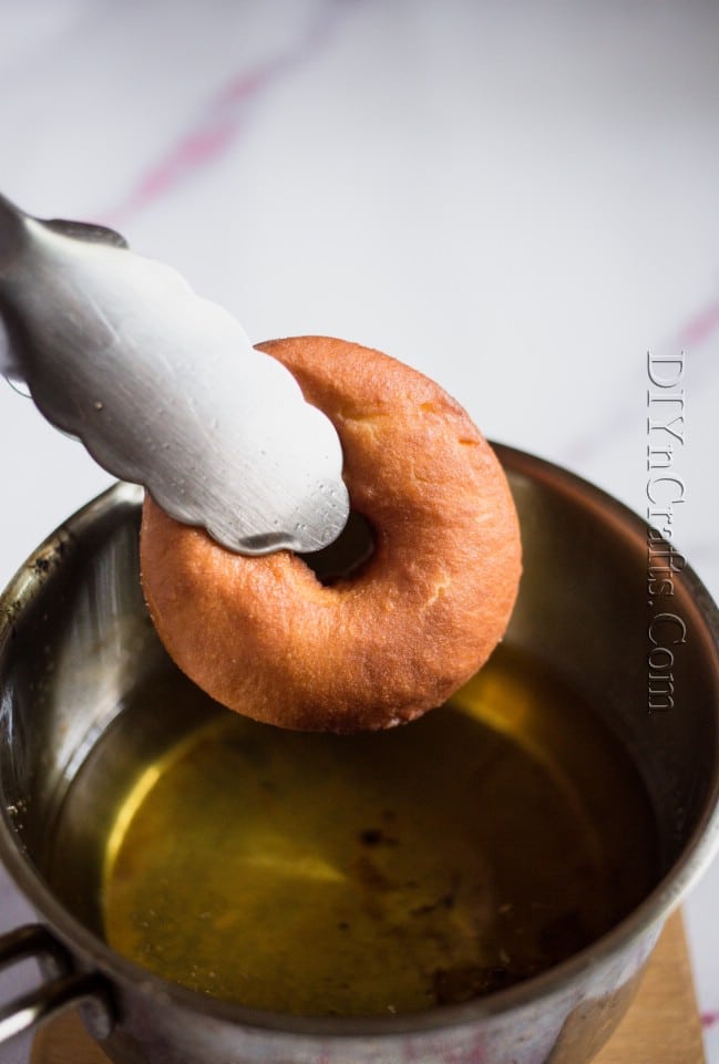 Frying the donuts