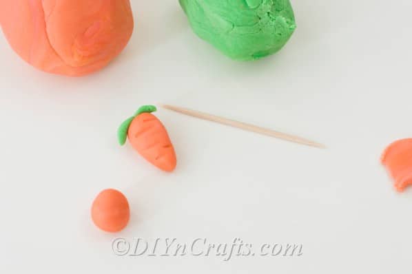 Fondant “carrots” decorate each cookie