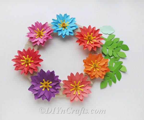 Add leaves and other cutouts to give your wreath more color
