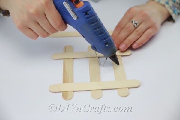 Gluing down popsicle stick coaster
