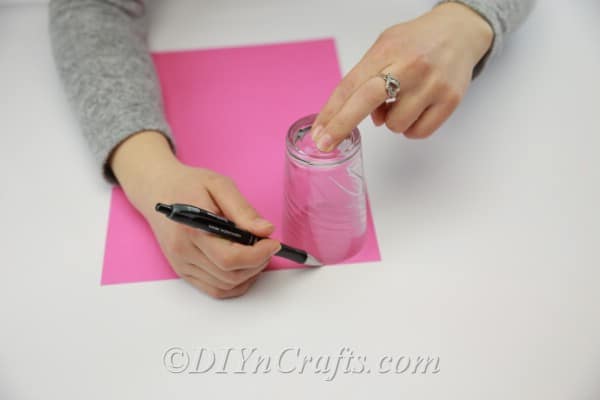Tracing a circle onto colored paper
