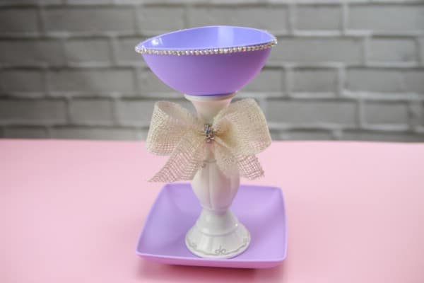 Purple jewelry holder with a white bow