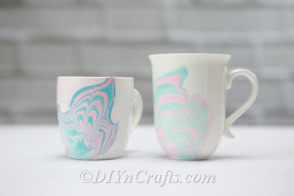 Two marbled coffee cups