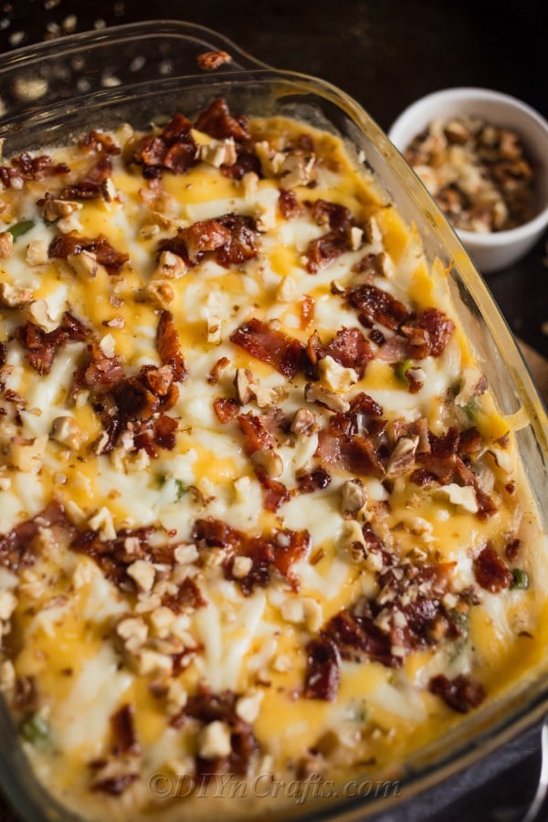 Green bean casserole with cheese and pecans