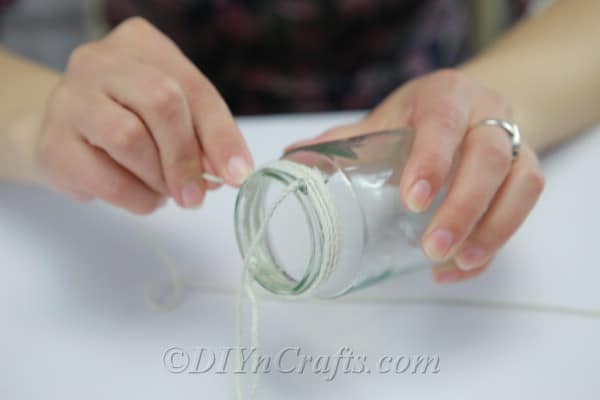 Gluing thread onto the top of a glass jar