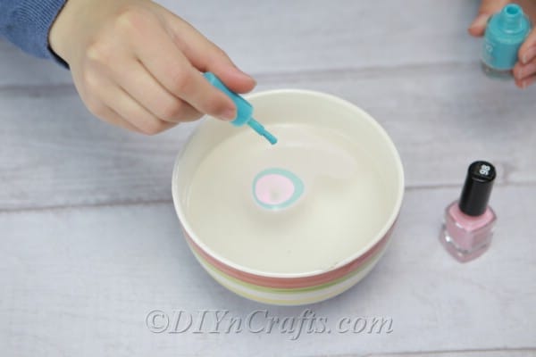 Adding more colors of nail polish to water bowl