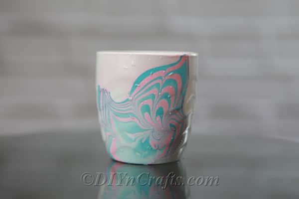 White coffee cup with pink and blue marbling
