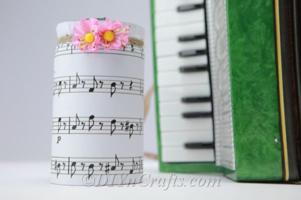 Music jar with pink flowers