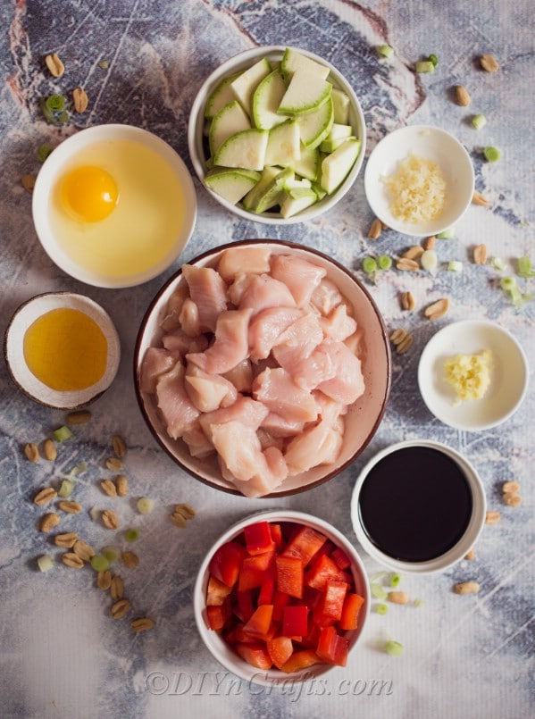 Chicken and other ingredients for kung pao chicken 