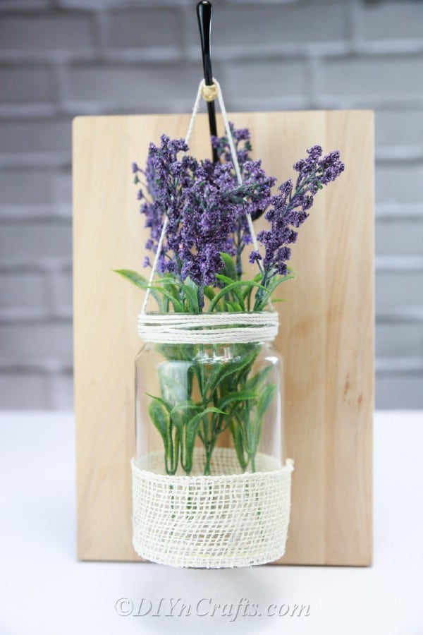 Floral rustic wall décor looks beautiful displaying lavender.