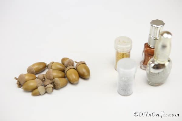 Supplies for making glitter acorns harvest craft