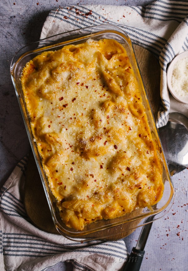 An overhead picture of a large baking sheet loaded with homemade baked mac and cheese