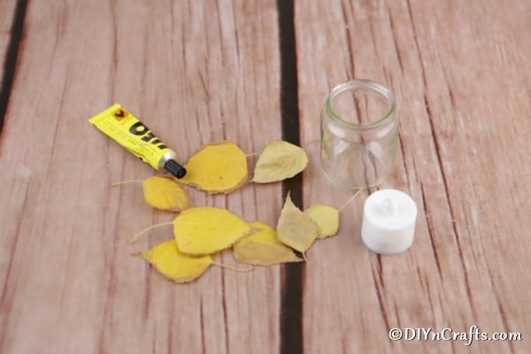 Supplies needed for making fall leaf candles lanterns