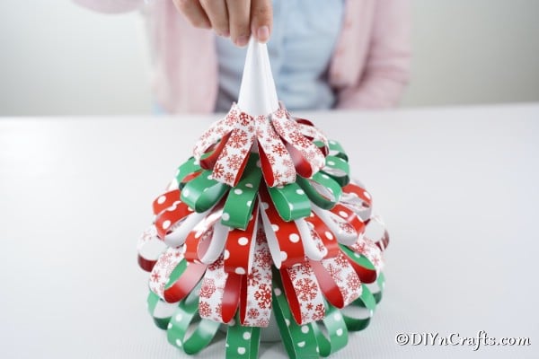 Adding paper loops to a paper strip Christmas tree