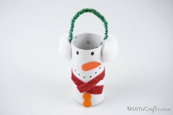 A completed snowman toilet paper rolls craft