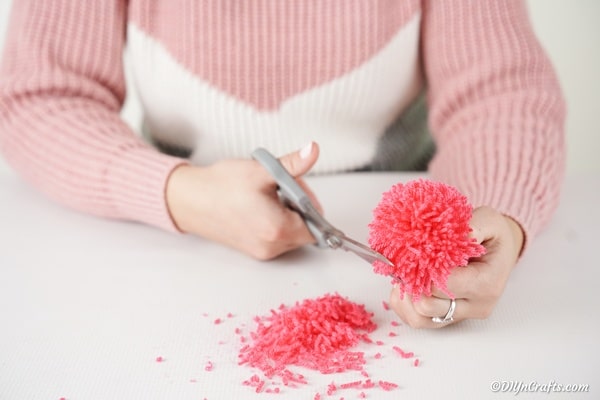 Trimming excess off of pom pom monster