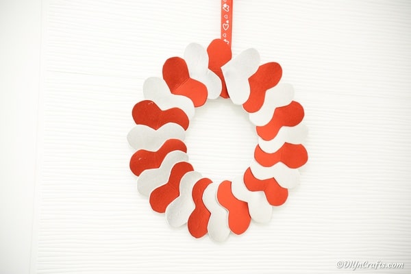 Valentine's day heart wreath against white wall