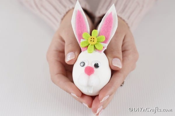 Easter egg bunny in hands