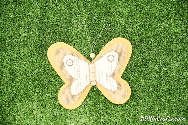 Burlap butterfly on grass